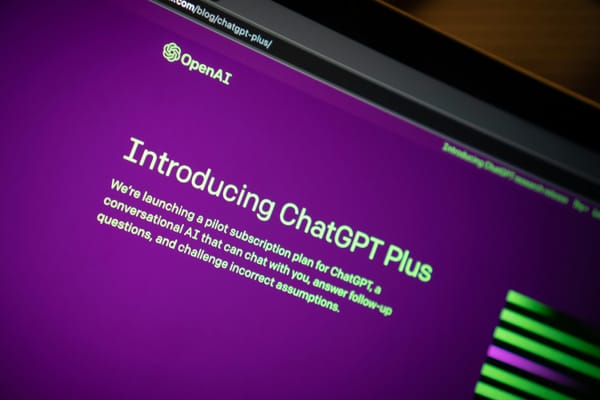 A laptop screen showing a blog post introducing ChatGPT Plus